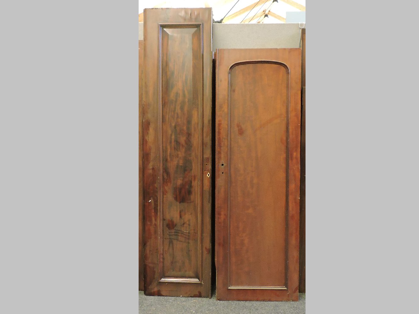 High mahogany panelled doors