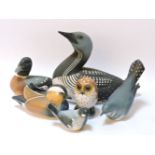 Helmsdale pottery birds, comprising a black throated diver, a cuckoo, a mandarin duck, another duck,