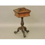 A Victorian rosewood work table, with tripod base