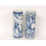 A pair of late 19th century blue and white sleeve vases