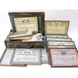 A small case of ephemera, cards, and related items, and eleven framed share certificates