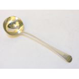 A heavy Victorian silver ladle