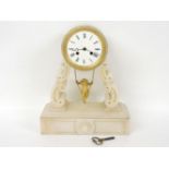 A French white marble mantel clock, with swinging cherub, pendulum and key