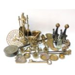 A collection of metal wares, to include andirons, a fireside campaign set, etc