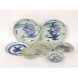 A collection of seven Chinese blue and white porcelain plates and bowls, early 18th century and