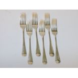 A matched set of six Georgian silver table forks, with marks for London 1809, maker's marks for