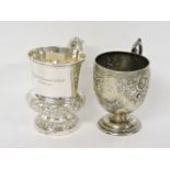 Two silver christening mugs, one 1867, the other 1759, later decorated, 11oz