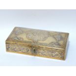 An Egyptian brass copper and silvered cigarette box, probably early 20th century, with framed