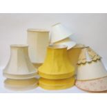 A large quantity of silk and paper lampshades