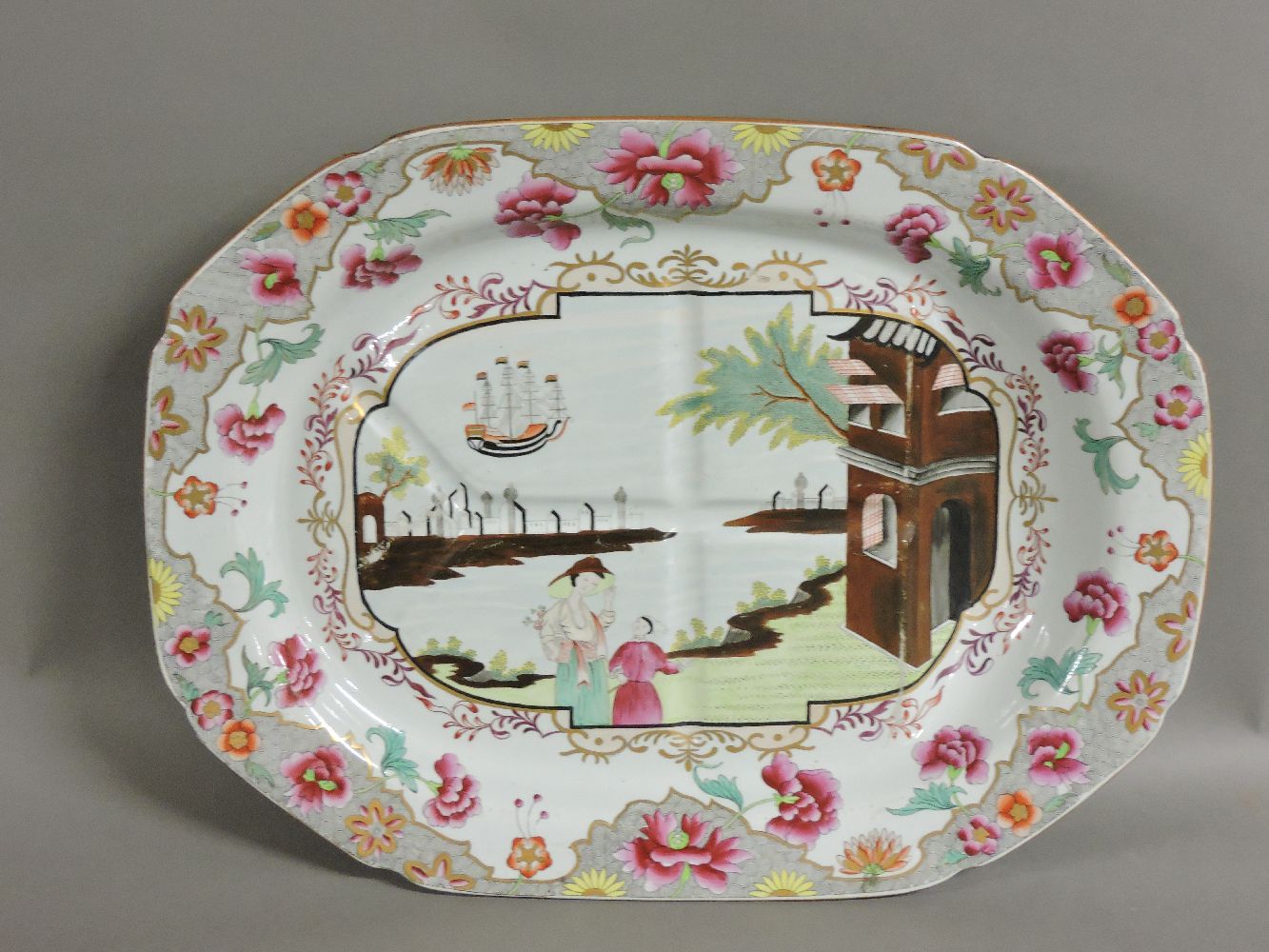 A Spode meat plate,19th century, pattern no 3067, decorated with a 'Chinese' scene of figures,