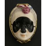 A Chelsea gold-mounted porcelain bonbonnière,modelled as a masked lady's head with rose cut