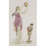 A Furstenberg harlequin,blue 'F' mark,12cm high, anda Vienna figure,of a lady playing a