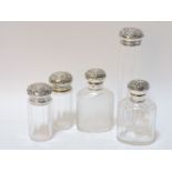 Five silver topped glass scent bottles