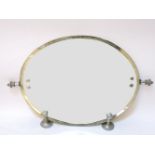 An Art Deco oval mirror with chrome frame and swivel wall bracket. Mirror 46 x 35cm