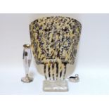 A mother of pearl calling card case, together with a silver faceted bud vase, and a Spanish peineta,