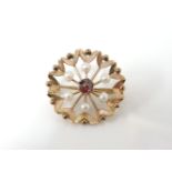 A 9ct gold garnet and cultured pearl flower brooch, 5.9g