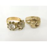 A 9ct gold textured knot ring, 3.6g, and a two stone white flower ring, band tested as 18ct gold,