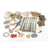 Miscellaneous items, silver handled butter knives, silver plate and coral baby's rattle, pennies,