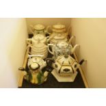 A collection of nine teapots to include 'Ye Daintee Ladyee Teapot', Royal Doulton, 'Under the