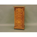 A Victorian oak Wellington chest (splits to top and left hand side)