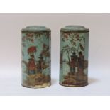 A pair of tins and covers, with chinoiserie decoration, 26cm high