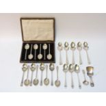 A set of cased silver teaspoons, CB&S, Sheffield 1923, set of 8 golf teaspoons and others, plus a