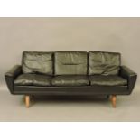 A Danish 1960 black leather sofa, by 'George Thomas', 183cm long