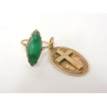 A gold oval pendant, with raised cross and engine turned decoration marked 375 to back, 5.5g, and