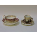 A Helena Wolfsohn cabinet cup and saucer, the handle modelled as gent wearing a tricom hand, and