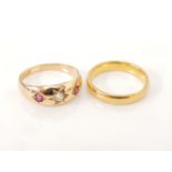 A 22ct gold court shaped wedding ring, and a 15ct gold star set diamond and ruby ring, 15ct gold 3.