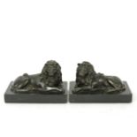 A pair of 19th century'Grand Tour' bronze lions on marble plinths. 12cm high