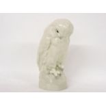 A German Heubach porcelain figure, of an owl, printed marked to base