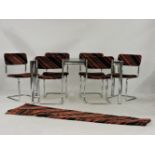 A 1980's chrome and black ask dining table, and six matching cantilever chairs, with matching