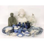 A collection of blue and white ceramics, a modern bust of a young lady and an oriental figure with