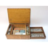 An oak box, containing a large quantity of silver coinage