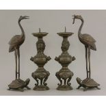 A pair of 20th century pricket candlesticks, double-lobed and with dragon knops below the sconces