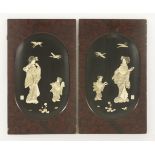 A pair of black-lacquered panels, c.1880, onlaid with carved bone, mother-of-pearl and ivory bijin