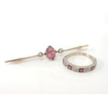 A gold oval cut pink tourmaline and diamond bar brooch, together with a gold ruby and diamond half