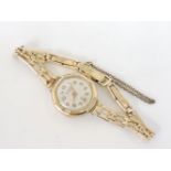 A 9ct gold ladies Lanco mechanical watch, with later gold metal core bracelet strap