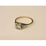 An Art Deco single stone gold diamond ring, with a modern brilliant cut diamond estimated as