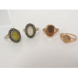 A 9ct gold signet ring, and a gold signet, together with two silver cabochon and marcasite rings