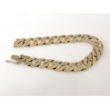 A 9ct gold textured curb link bracelet