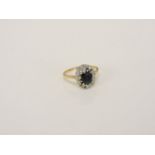 A gold sapphire and diamond cluster ring, mark rubbed, size N½, 3.25g