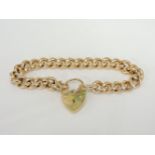 A 9ct gold curb link bracelet with padlock clasp, 47.77g