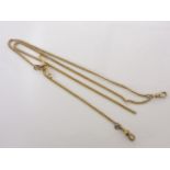 A gold curb link watch chain, with t-bar, tested as gold but t-bar gilt metal, 15.8g