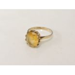 A 9ct gold single stone oval cut citrine ring, size P, 3.37g