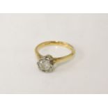 An 18ct gold illusion set single stone diamond ring, size M, 3.20g