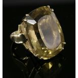 A 9ct gold single stone Cairngorm ring,with a rectangular Brazilian cushion cut Cairngorm, double