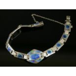 An Arts and Crafts silver and enamel bracelet, c.1900,by Murrle Bennett, with a lozenge-shaped