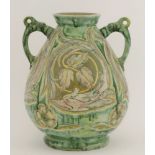 A Della Robbia Birkenhead pottery vase,c.1894 -1901, the ovoid body decorated with foliage and